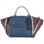 Bolso  GUESS azul y burdeos  por  90.00€